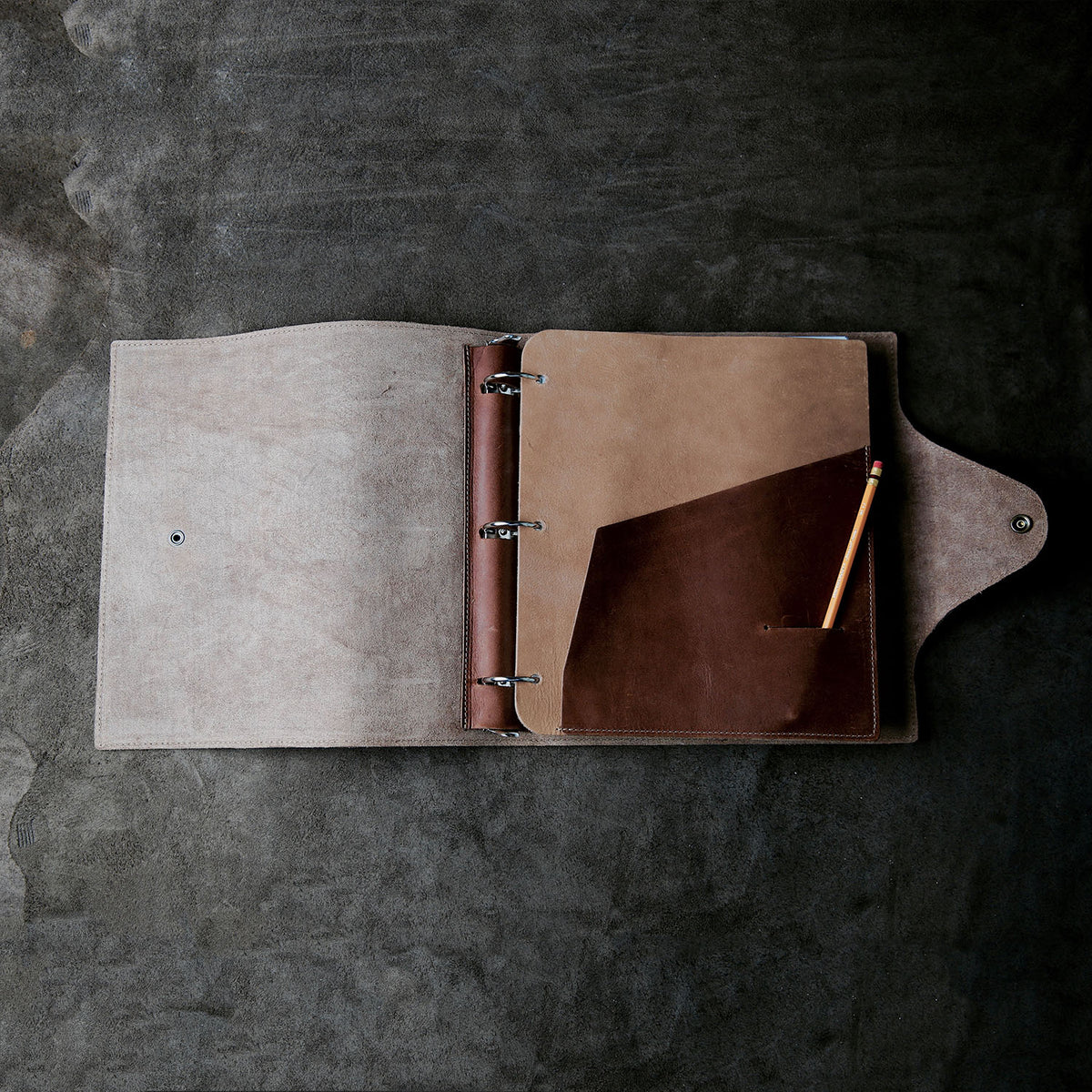 Crimson Tide Langley Fine Leather 3 Ring Binder with pockets and pencil holder, featuring a sleek design.
