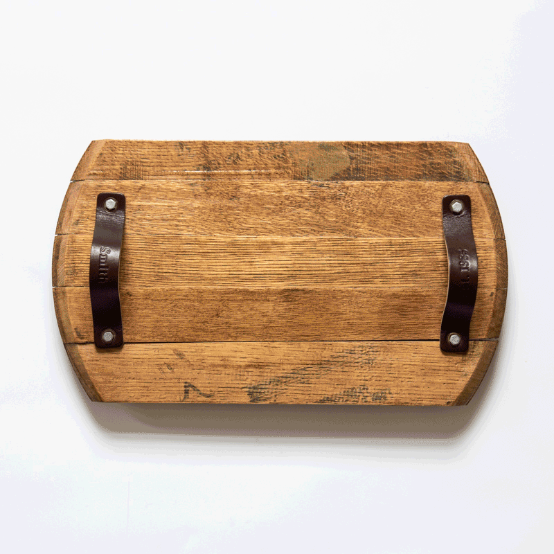 Butler Tennessee Whiskey Barrel Charcuterie Board with leather handles, perfect for serving and home decor.