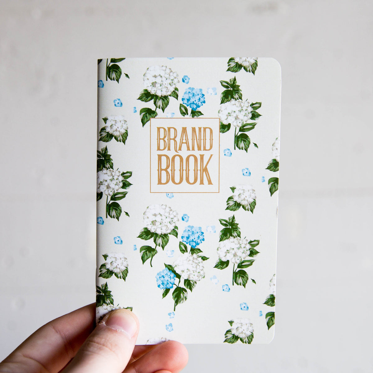Alabama Surveyor Fine Leather Pocket Journal Cover with floral design and gold lettering.