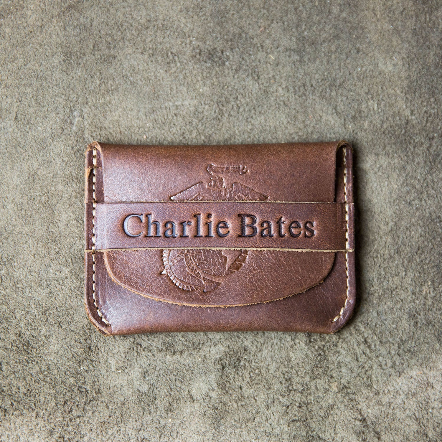 Fine leather front pocket wallet with flap closure and Marine Corps logo