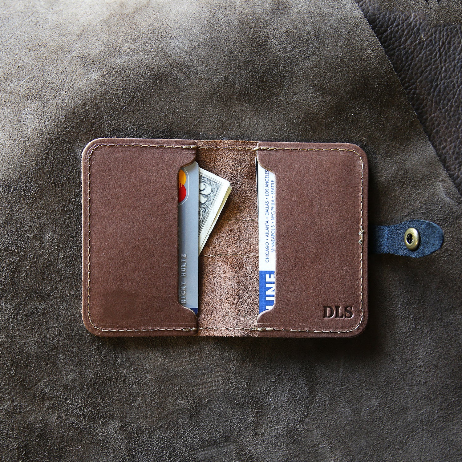 Fine leather snap closure bifold wallet with personalized initials and Auburn University logo