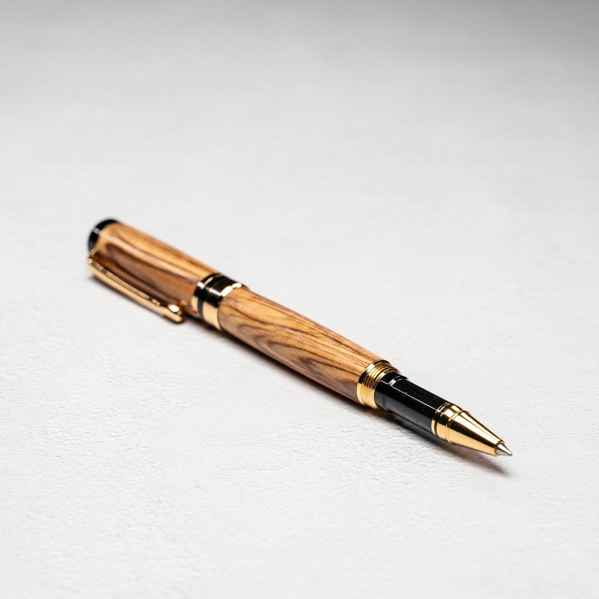 Hand - Turned Olive Wood Rollerball Pen + Fine Leather Pen Sleeve - Holtz Leather