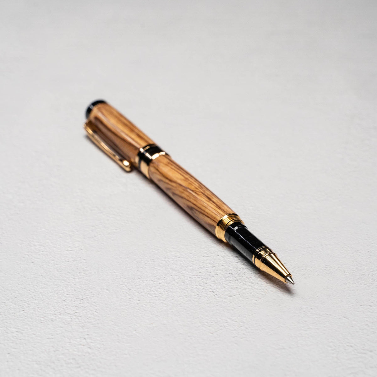 Hand - Turned Olive Wood Rollerball Pen + Fine Leather Pen Sleeve - Holtz Leather
