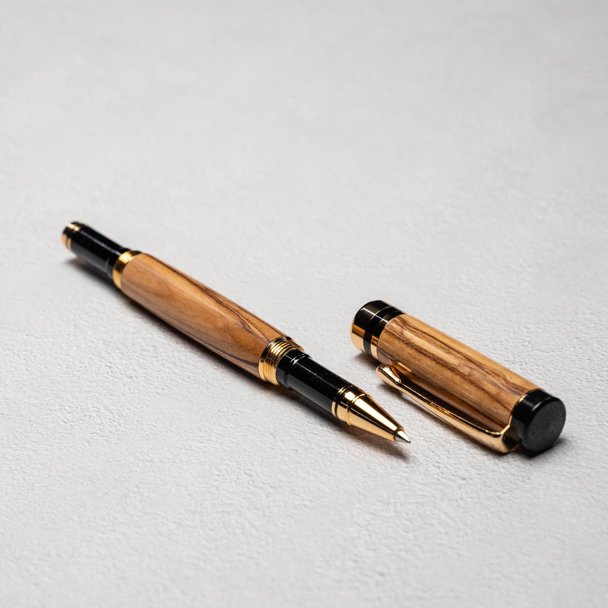 Hand - Turned Olive Wood Rollerball Pen + Fine Leather Pen Sleeve - Holtz Leather
