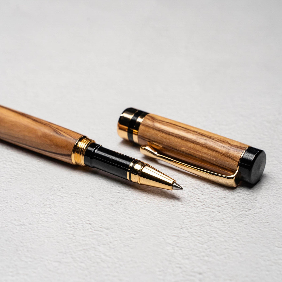 Hand - Turned Olive Wood Rollerball Pen + Fine Leather Pen Sleeve - Holtz Leather