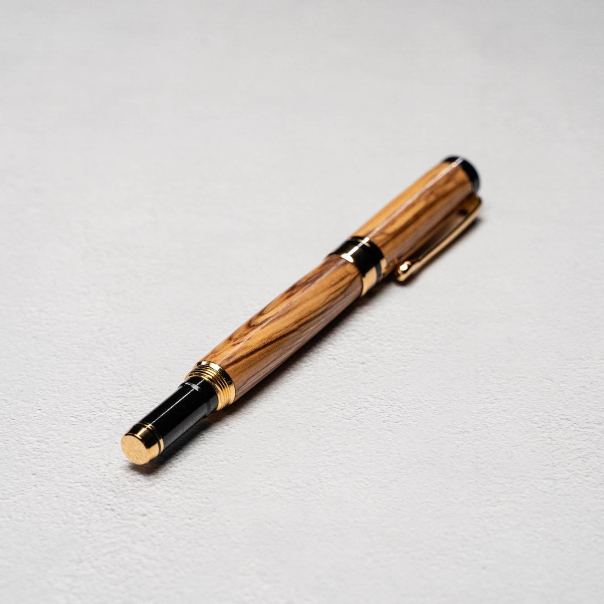 Hand - Turned Olive Wood Rollerball Pen + Fine Leather Pen Sleeve - Holtz Leather