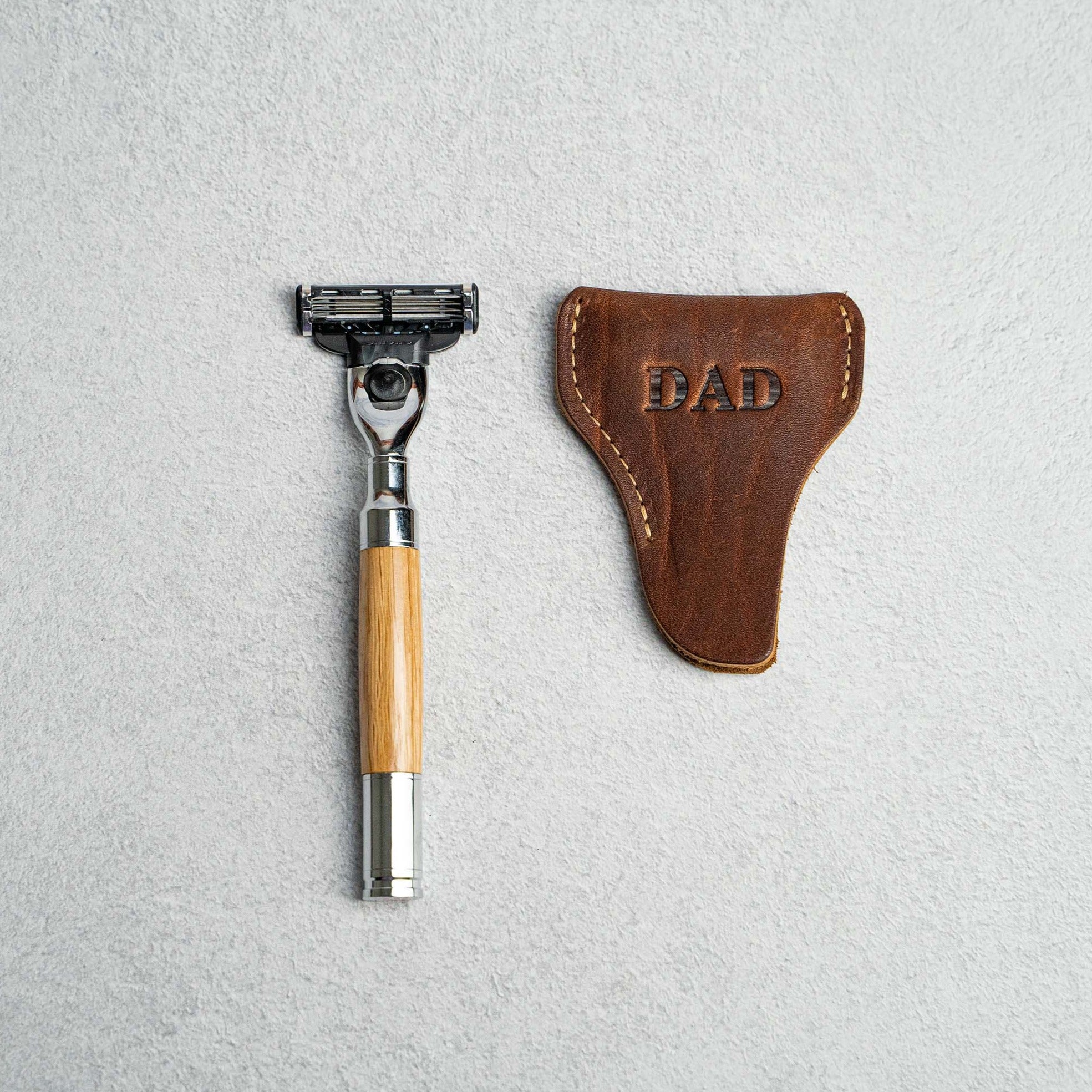 Mach3 Razor with Tennessee Whiskey Barrel wooden handle and a personalized leather sheath.
