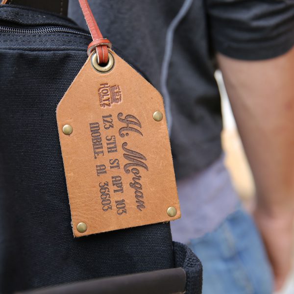 Fine leather luggage tag with personalized name and address
