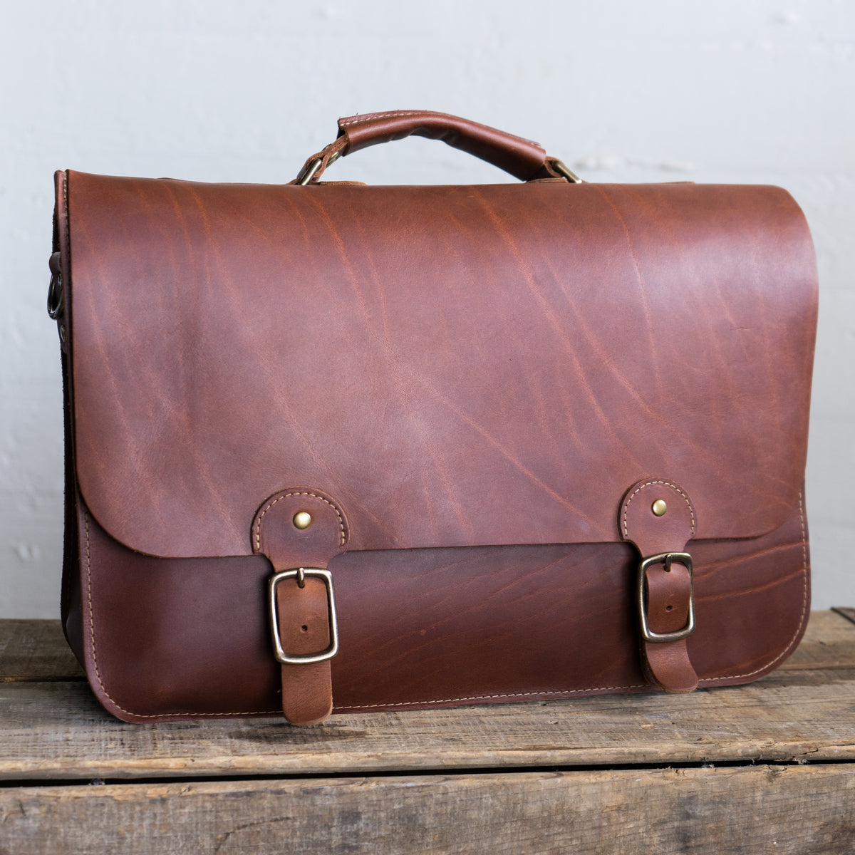 Leather messenger bag/briefcase with buckles from Holtz Leather Co in Huntsville, Alabama