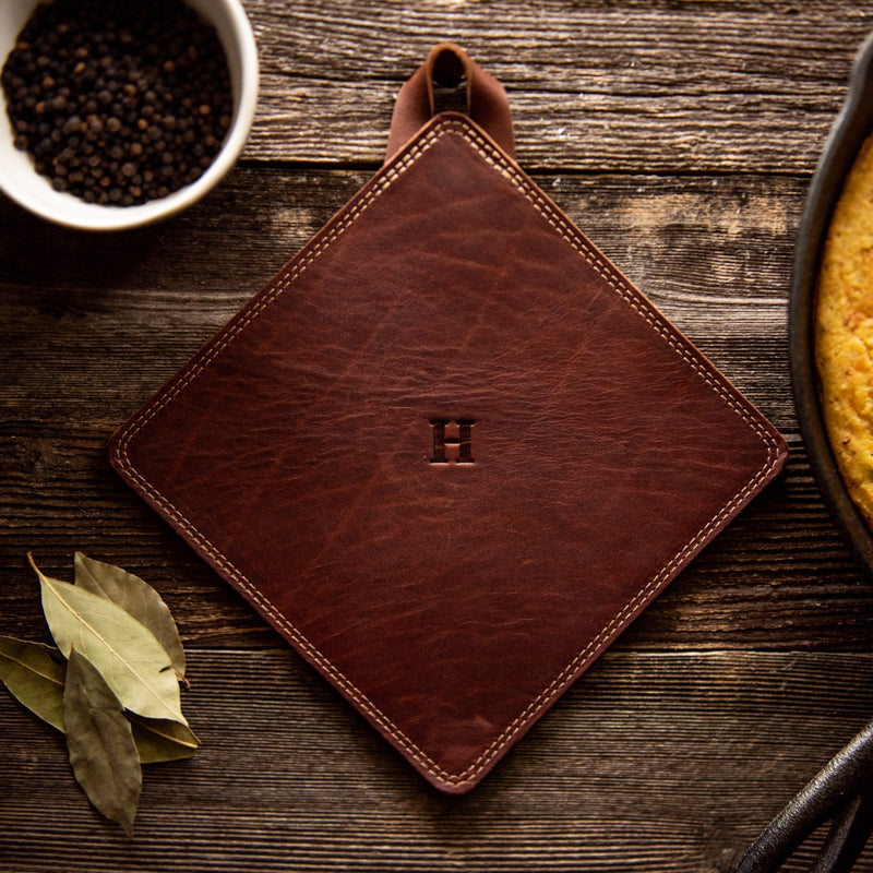 Trivet made of fine American leather with a personalized initial. From Holtz Leather Co in Huntsville, Alabama