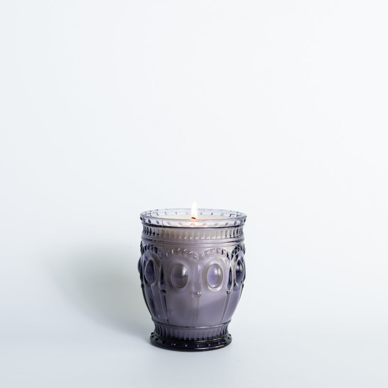 Lavender scented candle in purple vintage glass jar, hand-poured by Holtz Leather Co in Huntsville, Alabama