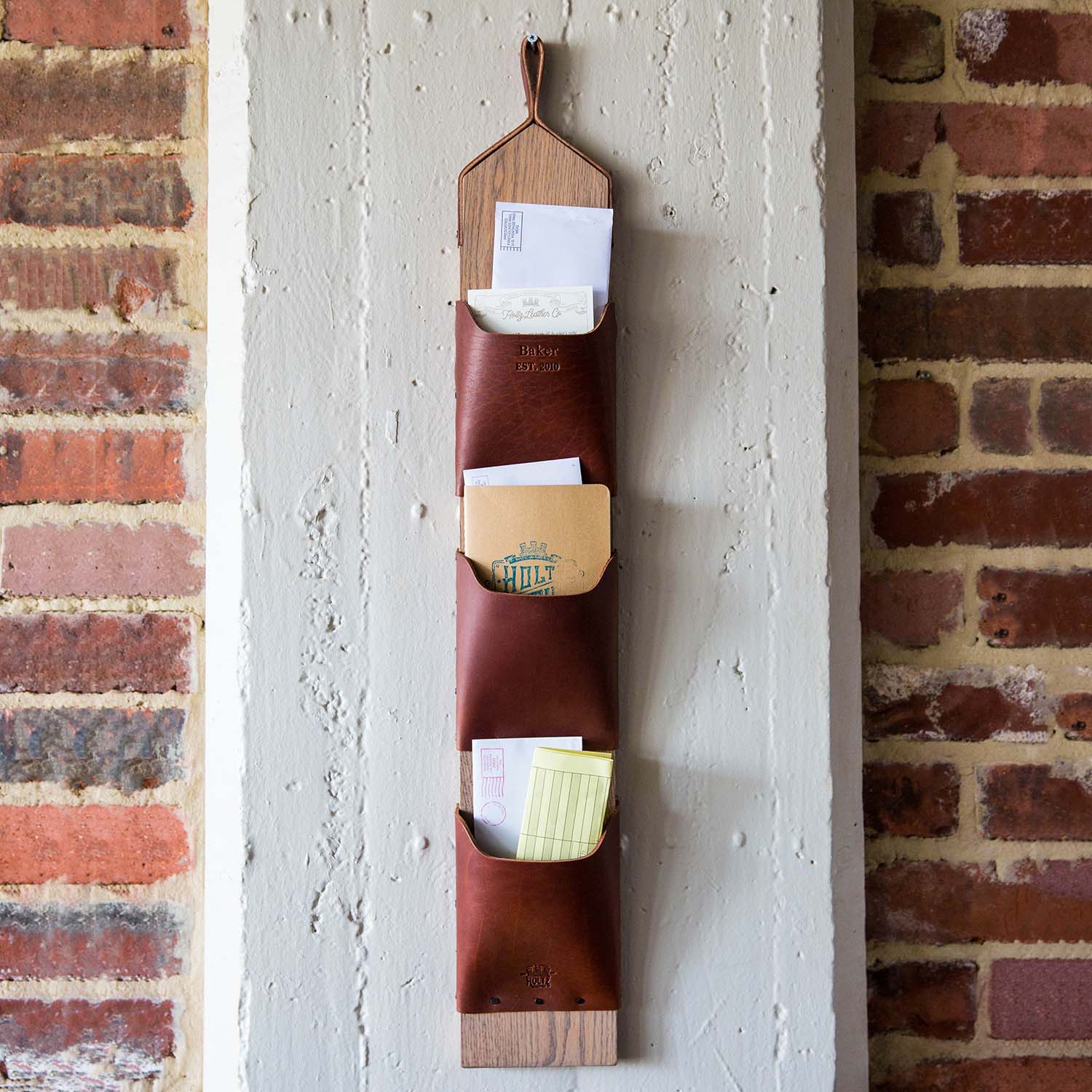 Wall mounted mail organizer and letter rack made of wood and fine American leather