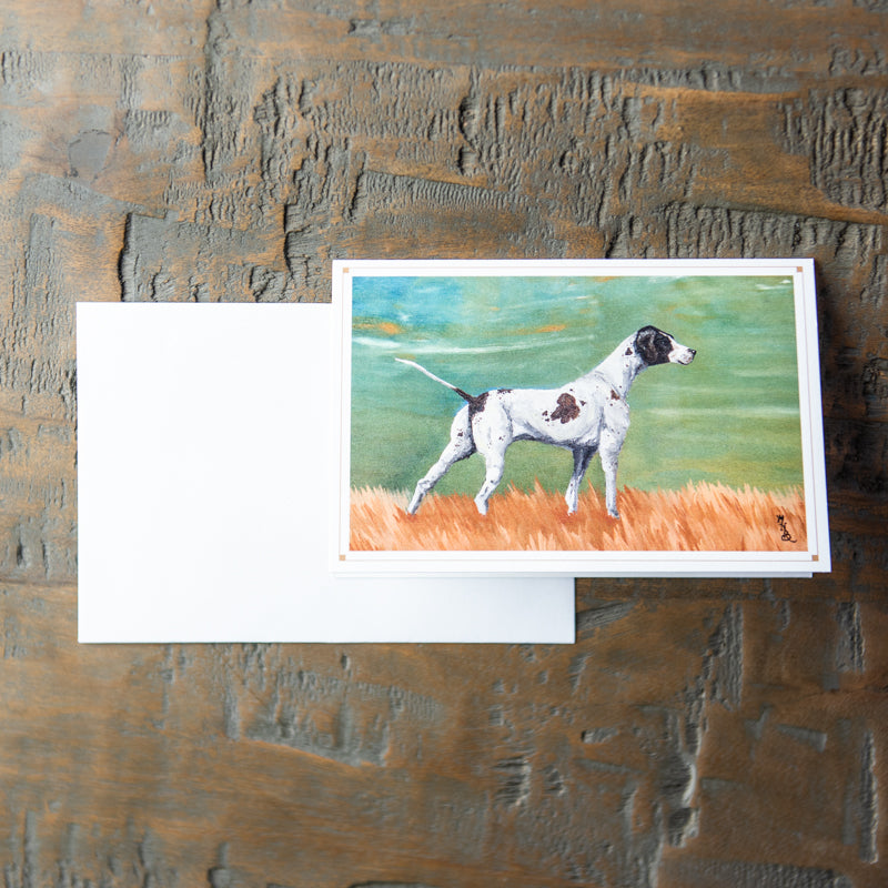 Card stationery with painting of a black hound dog in a field