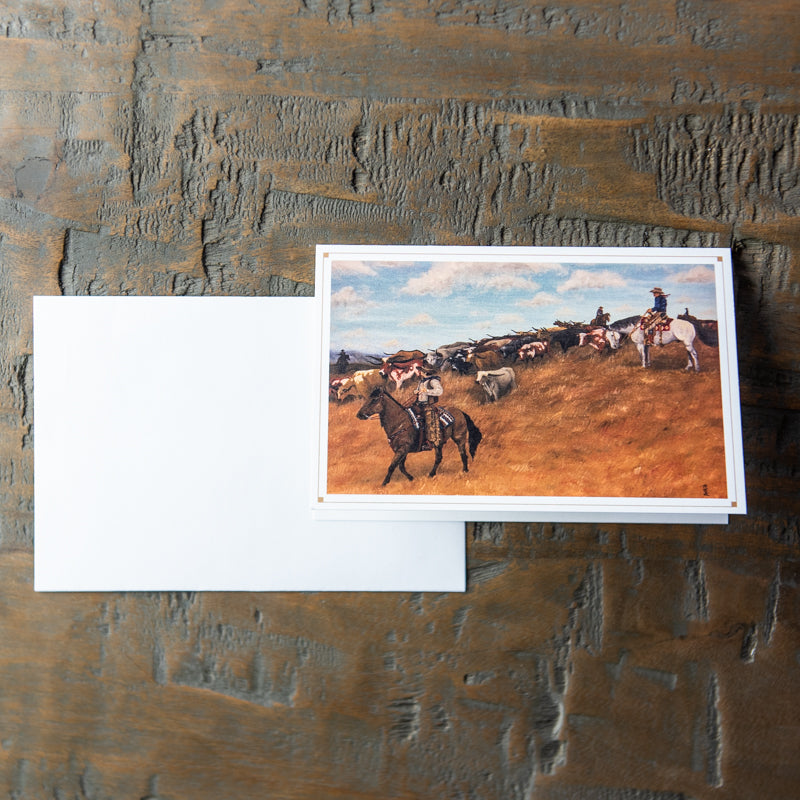 Stationery card with painting of cowboys herding cows.