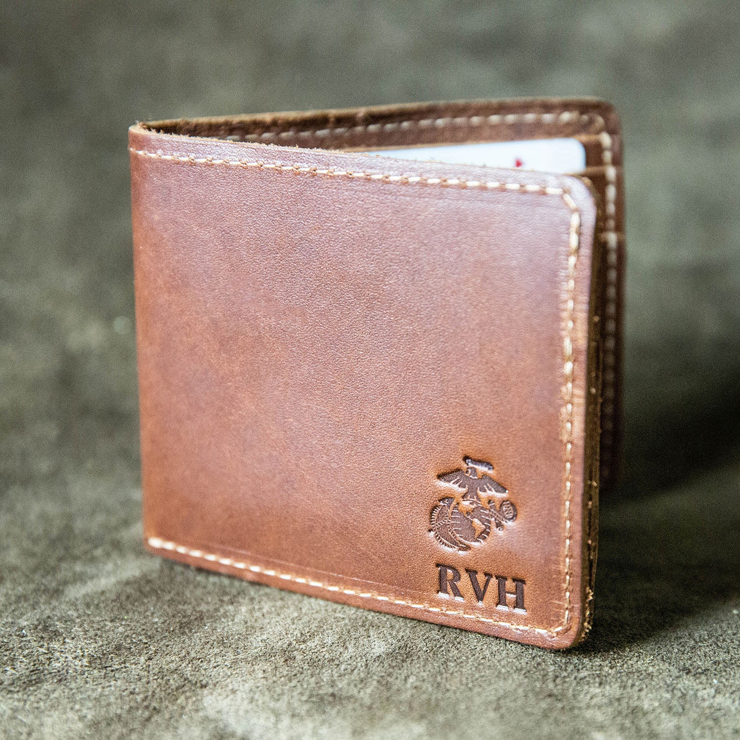 Fine leather bifold wallet with personalized initials and Marine Corps logo at Holtz Leather Co in Huntsville, Alabama