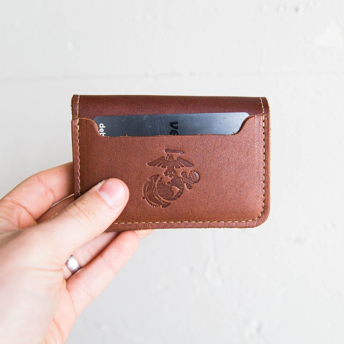 Fine leather bifold money clip wallet with Marine Corps logo