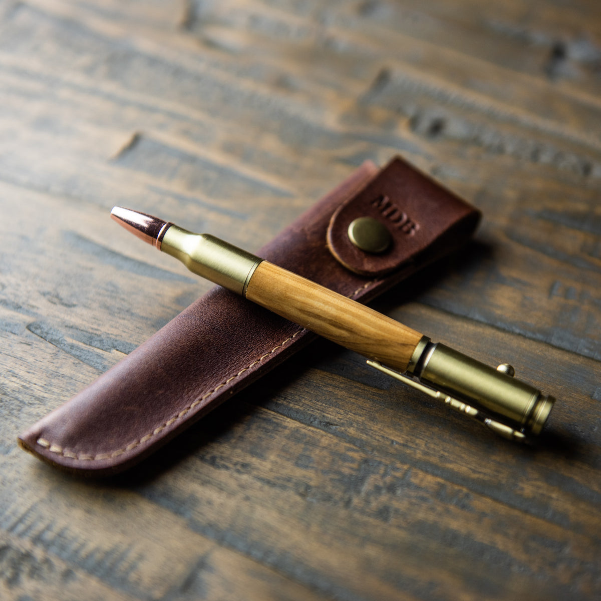 Olive Wood .30 Caliber bolt action pen and personalized leather pen sleeve