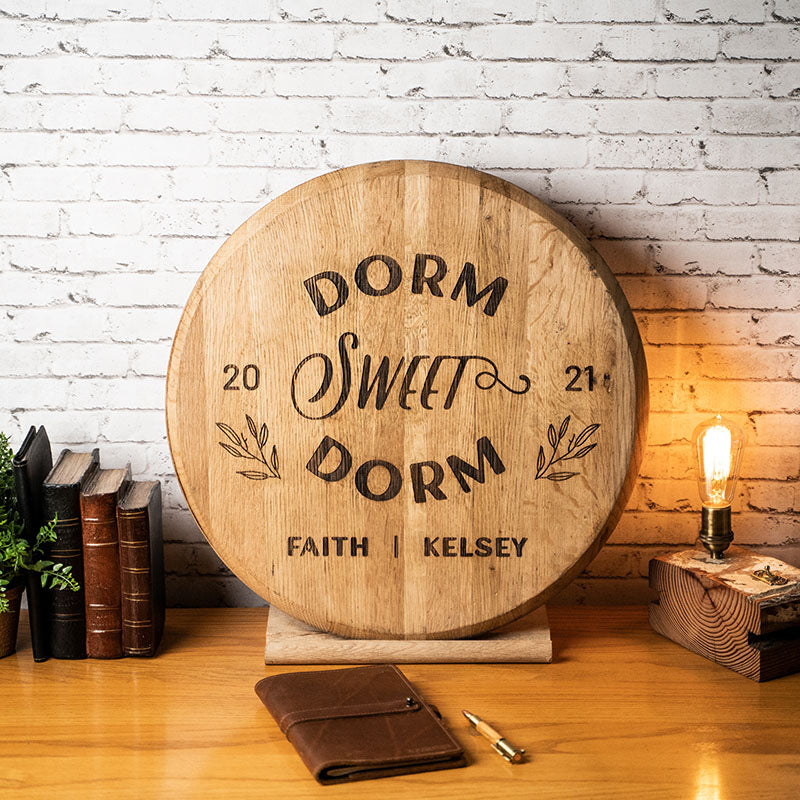 Sign made of Tennessee Whiskey barrel head with &quot;dorm sweet dorm&quot; and personalized name and years written on it