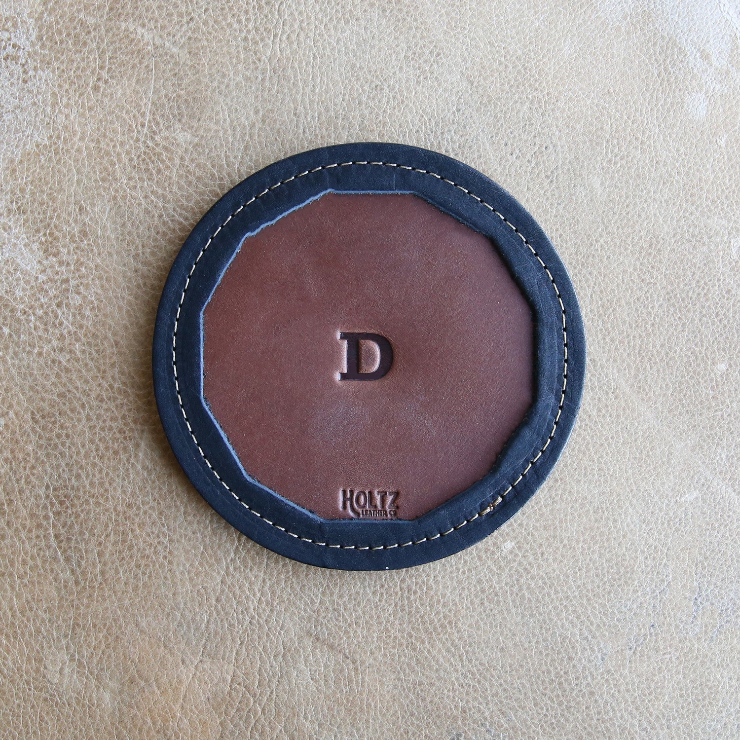 Set of 4 fine American leather coasters with personalized initial handcrafted at Holtz Leather Co in Huntsville, Alabama