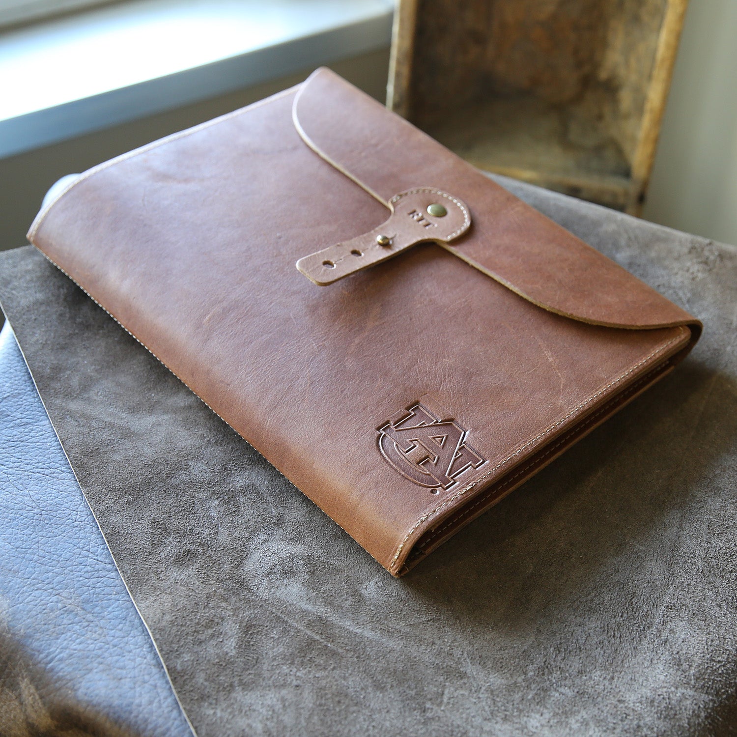Fine leather A4 moleskin journal cover with Auburn University logo and personalized initials