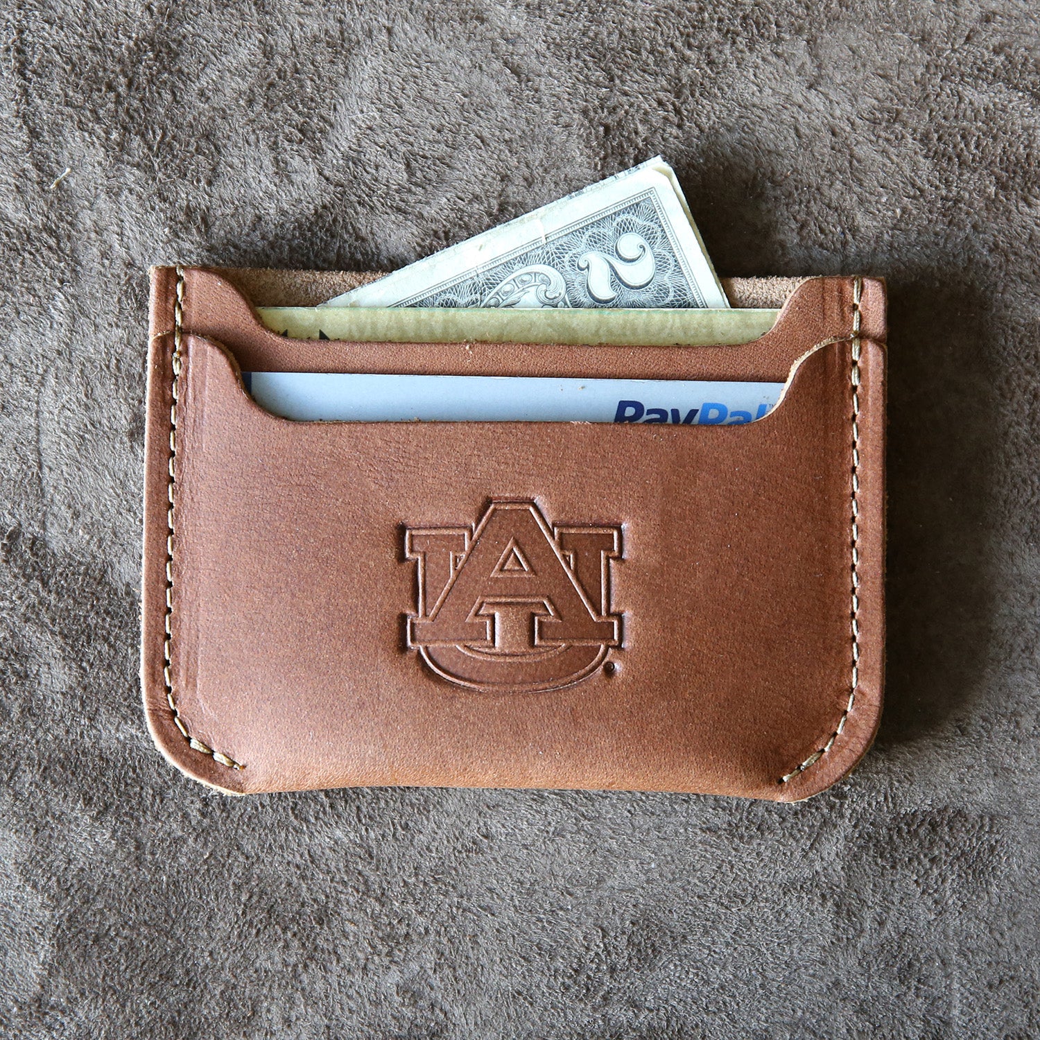 Fine leather front pocket double sleeve wallet with Auburn logo