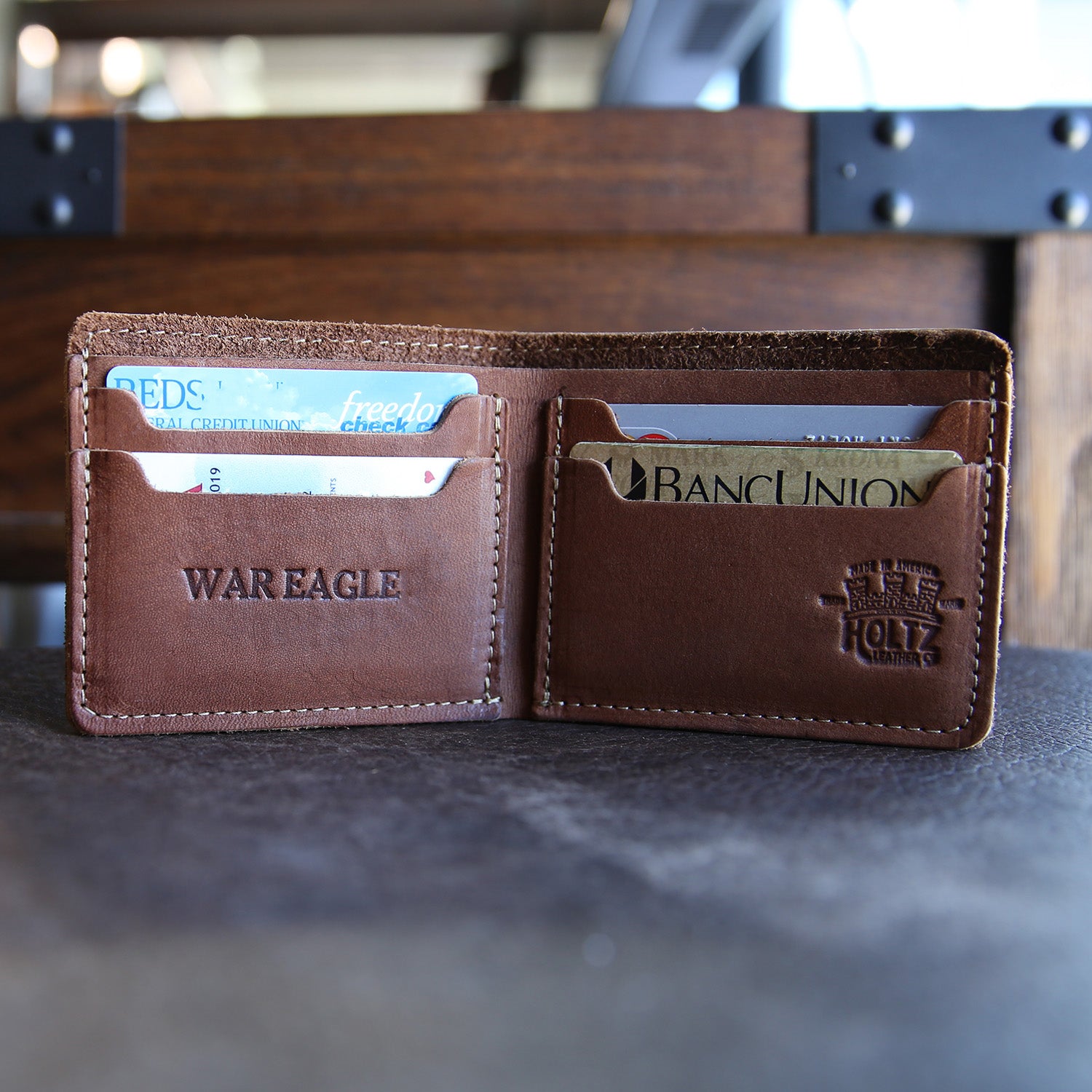 Fine leather bifold wallet with Auburn University logo