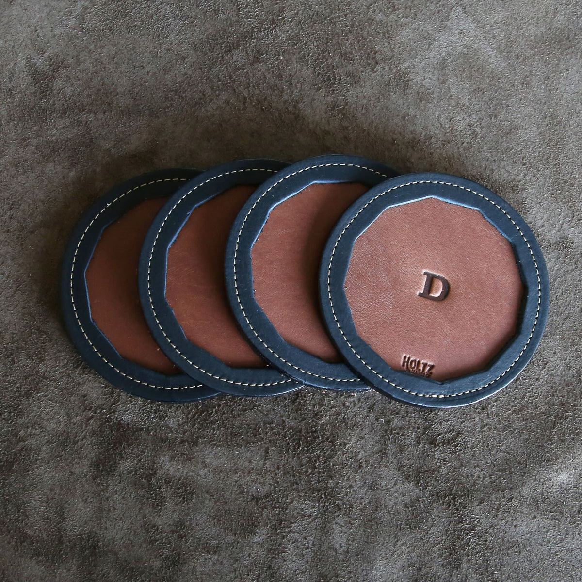 Set of 4 fine American leather coasters with personalized initial handcrafted at Holtz Leather Co in Huntsville, Alabama