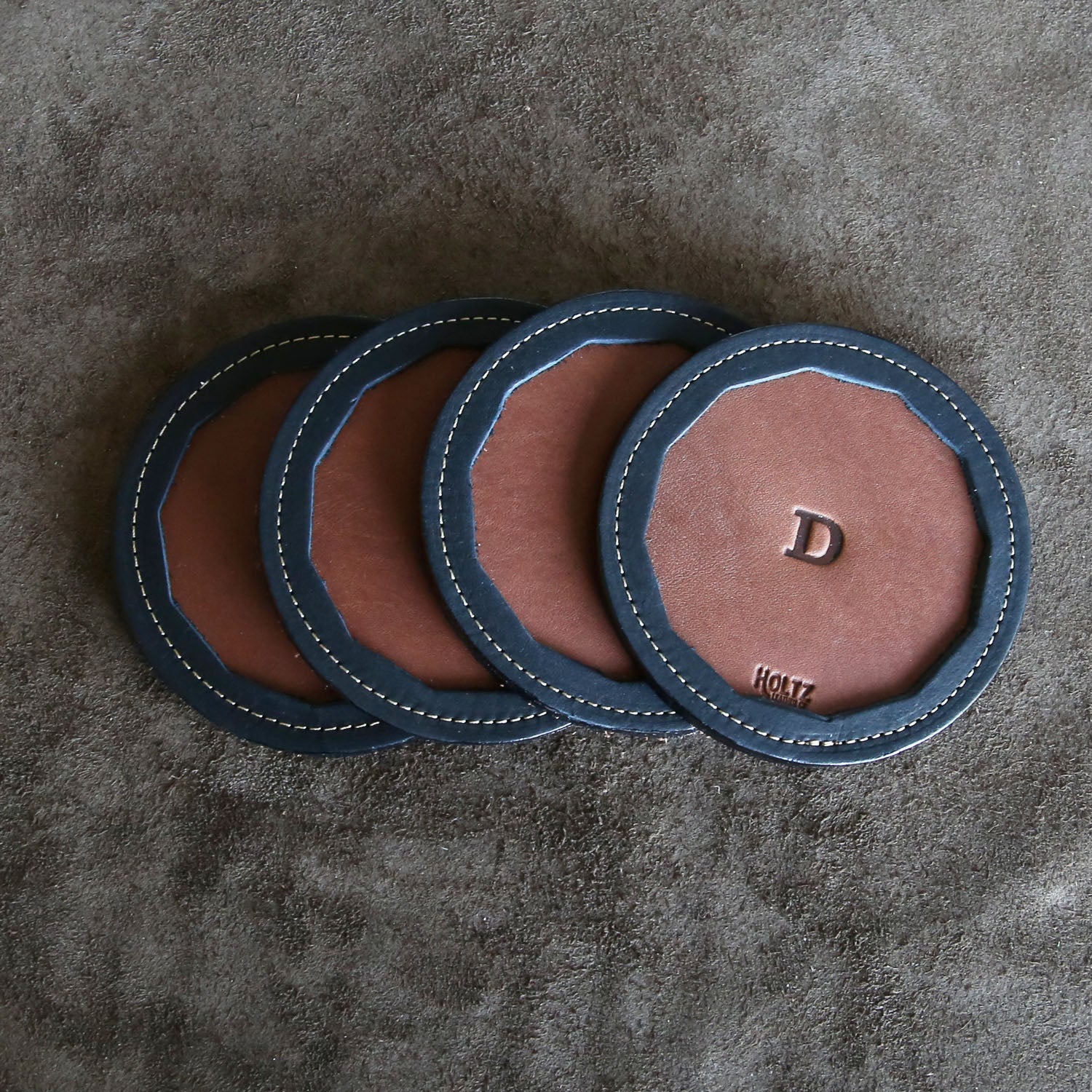 Set of 4 fine American leather coasters with personalized initial handcrafted at Holtz Leather Co in Huntsville, Alabama