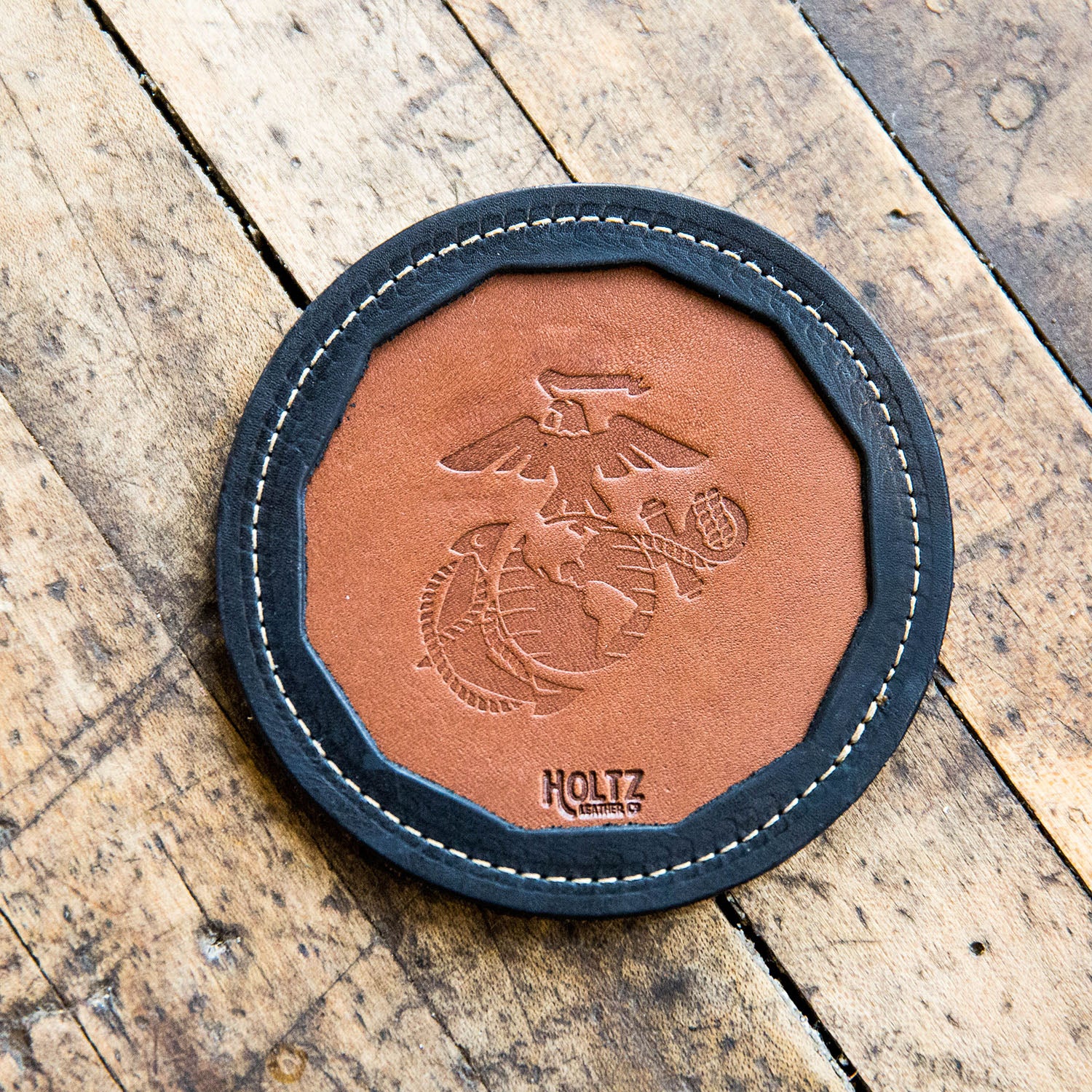 Fine leather coaster with Marine Corps logo and Holtz Leather Co logo