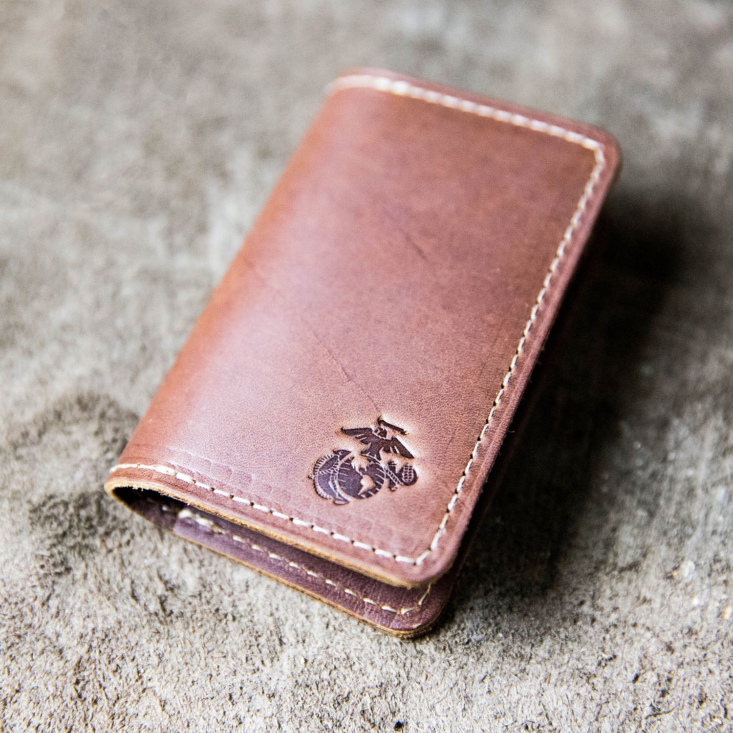 Fine leather bifold wallet and business card holder with Marine Corps logo
