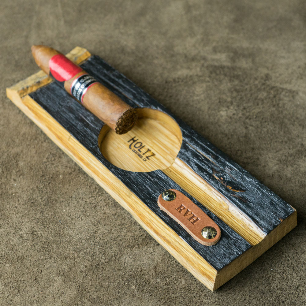 Cigar holder with ashtray made of Tennessee Whiskey Barrel wood with personalized leather piece.